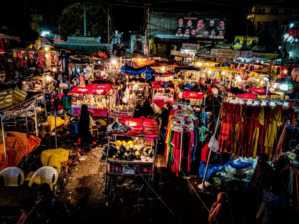 Bustling night market with colorful stalls, one of the best street shopping places in Hyderabad.