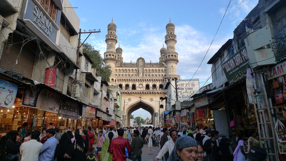 **Alt Text:**
Charminar overlooking the bustling Laad Bazaar, one of the best street shopping places in Hyderabad.